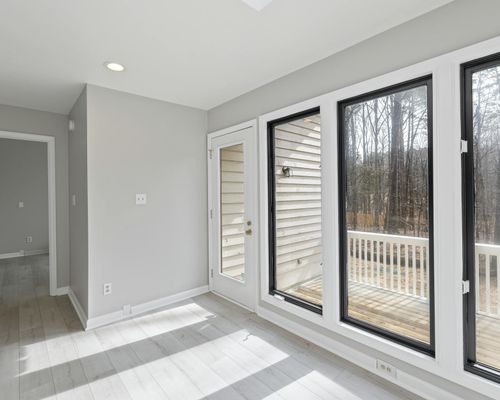 Wide view of an empty bright room for fitness